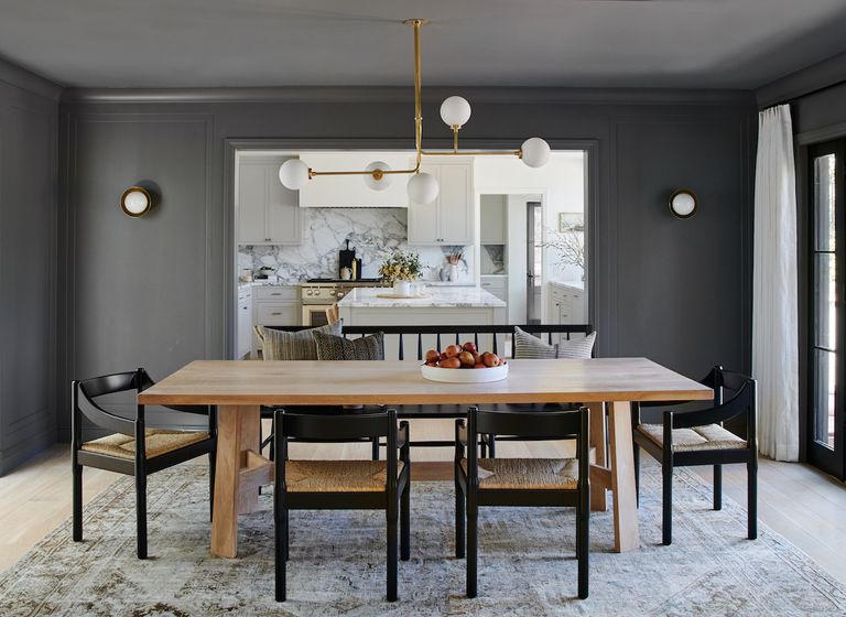 a dining room painted in all grey