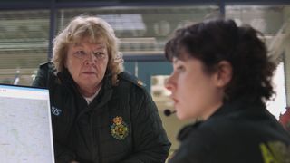 Paramedic Jan keeps a close eye on Indie, during her shift on emergency calls.