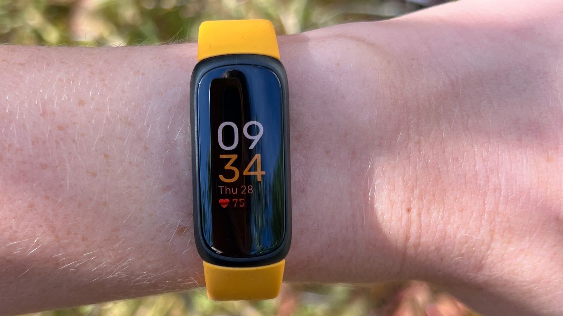 Grace Walsh wearing the Fitbit Inspire 3