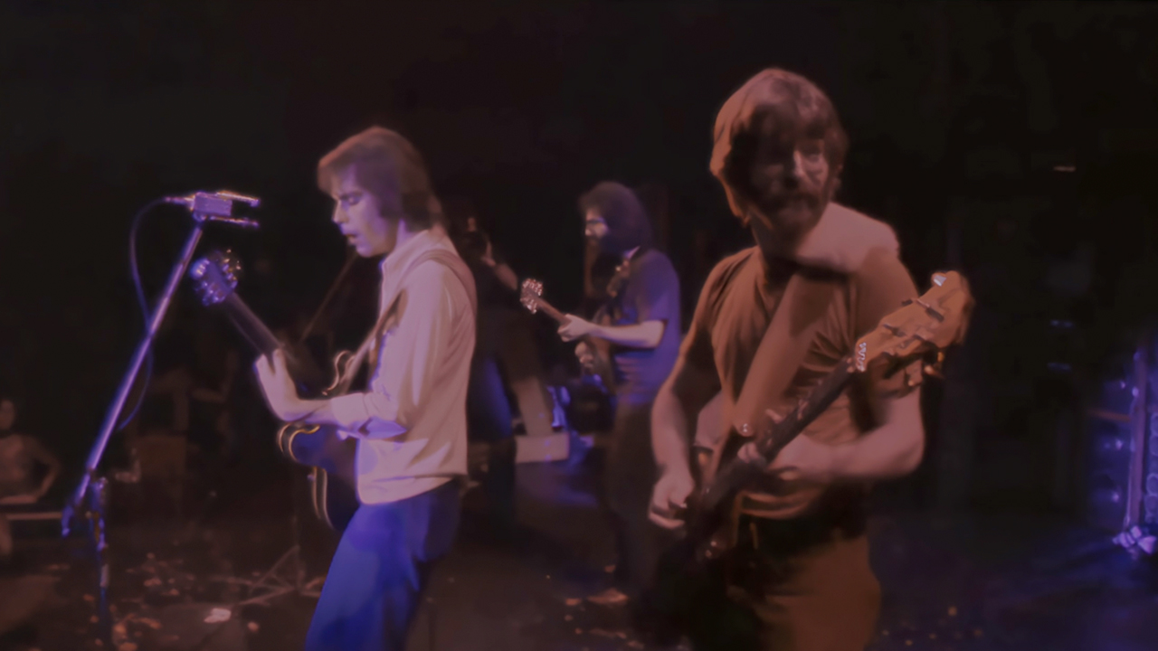 From left to right, Bob Weir, Jerry Garcia, and Phil Lesh from the Grateful Dead on stage in The Grateful Dead Movie