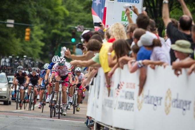 The front group chasing the break with one lap to go.
