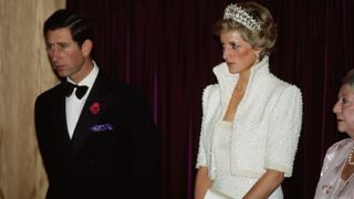 British Royals Charles, Prince of Wales and Diana, Princess of Wales (1961-1997), wearing a white Catherine Walker dress and jacket with the Cambridge Lover's Knot Tiara, attend the opening of the Hong Kong Cultural Centre, Kowloon, Hong Kong, 8th November 1989. Diana's dress, embroidered with sequins and pearls, is also known as the 'Elvis' dress. The Royal Couple is on a three-day visit to Hong Kong.