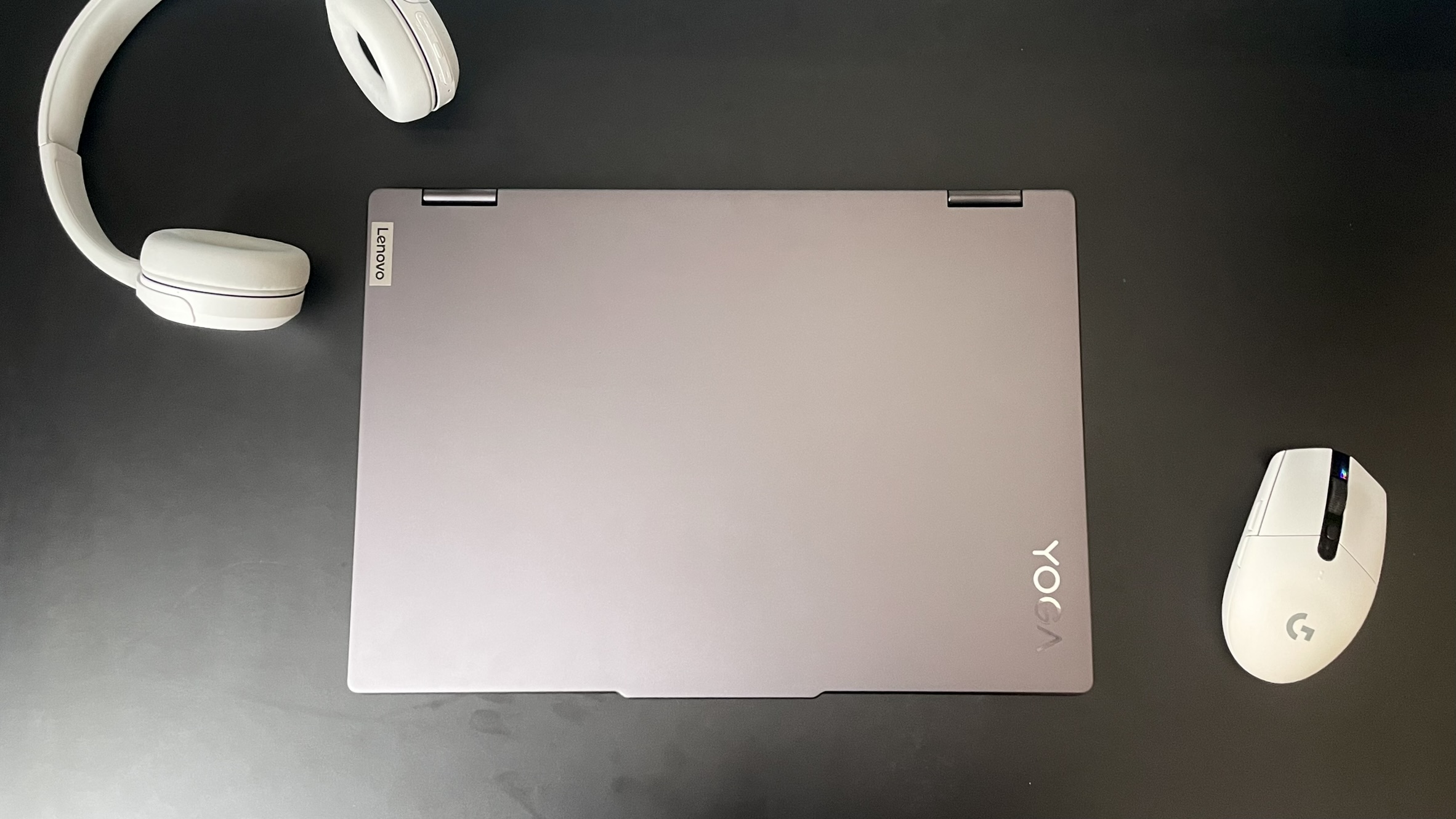 The 2024 Lenovo Yoga 7i Gen 9 2-in-1 laptop featuring metallic gray chassis