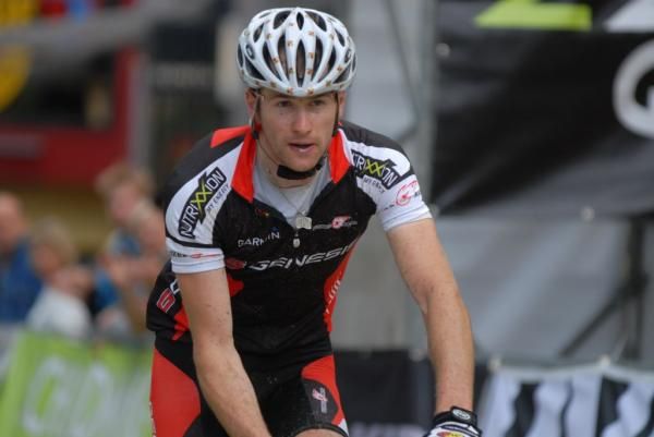 Defending Champion Uwe Hochenwarter races to the finish after a flat tire.