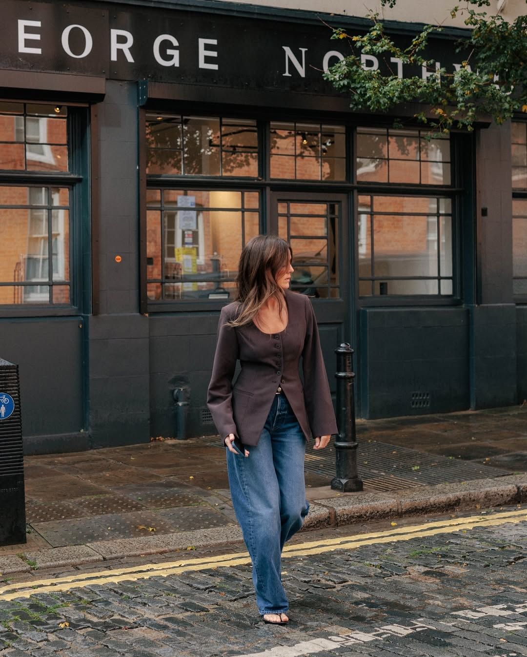 @kimturkington_ wearing a brown blazer and jeans