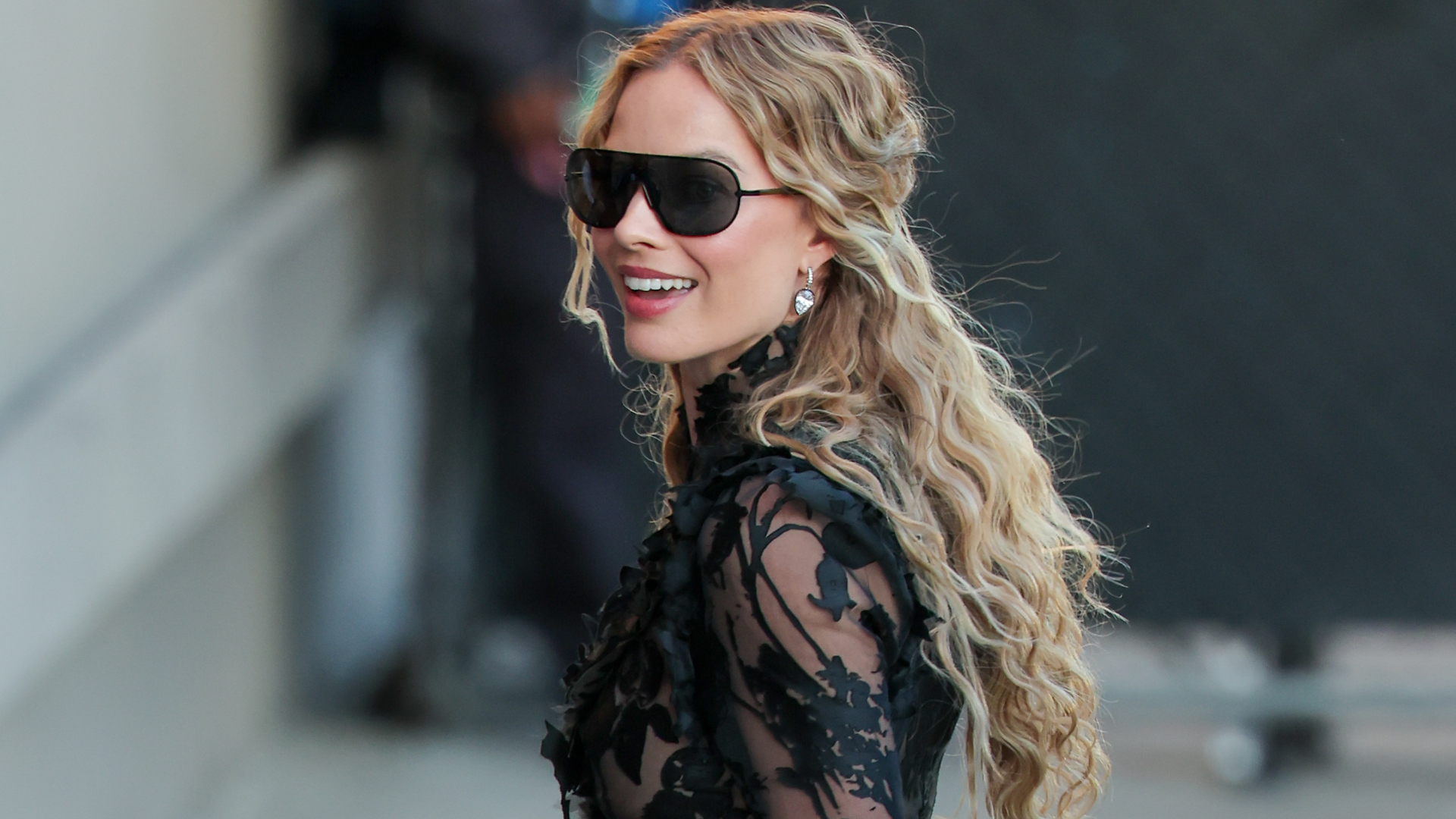 Margot Robbie began her 'Wuthering Heights' press tour in a lacy naked little black dress from Alexander McQueen