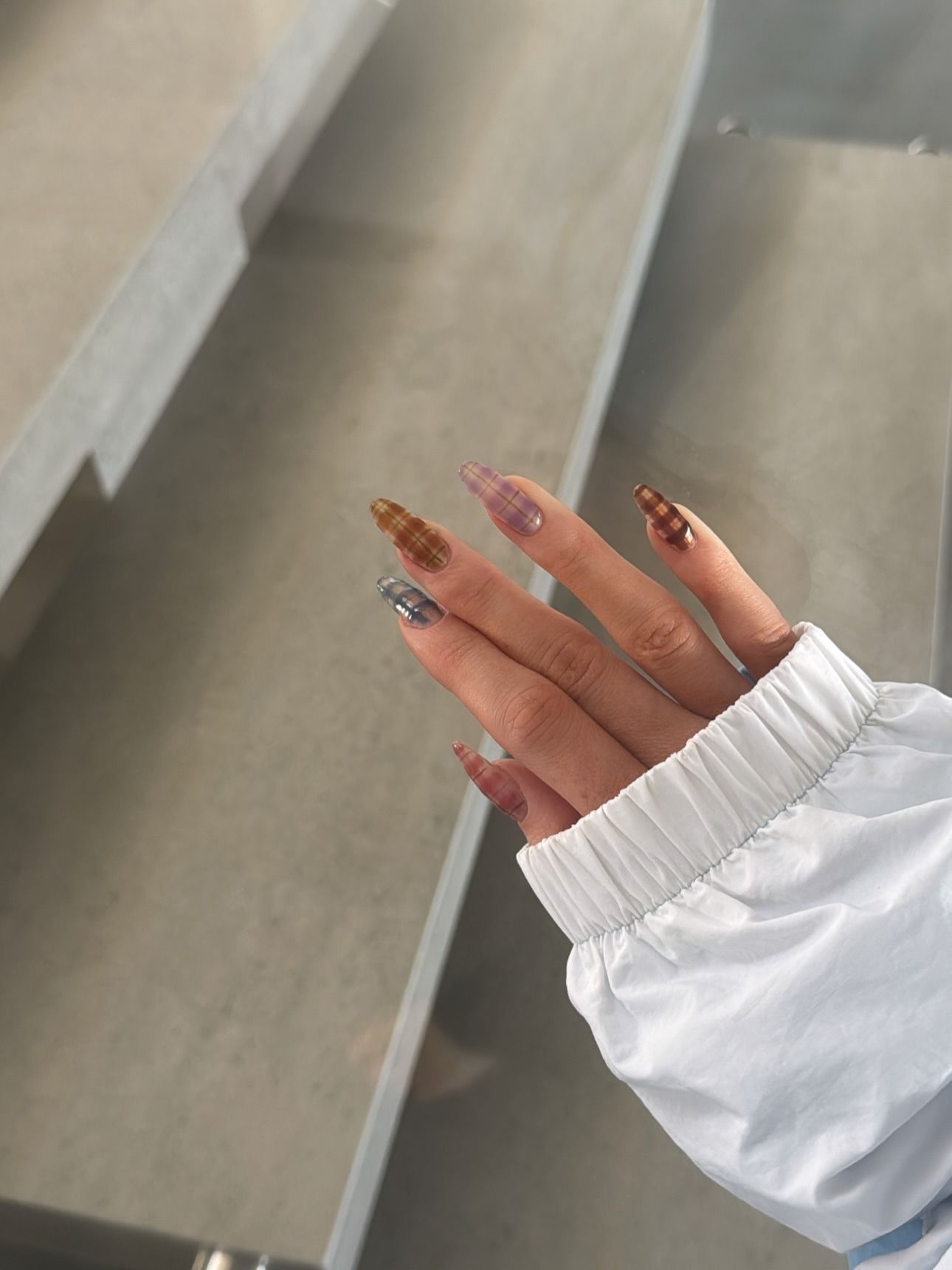 Photo of Kylie Jenner's jelly plaid nails