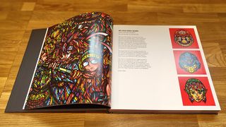 Bitmap Books interview; a game art book open on a wooden table