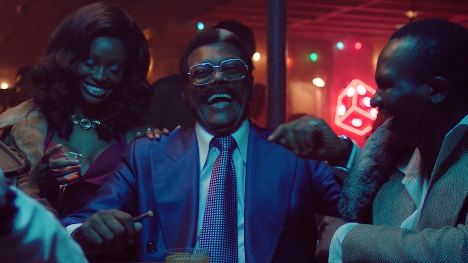 Samuel L. Jackson smiling in Fight Night: The Million Dollar Hesit