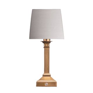 Rechargeable table lamp with brass handle and white shade