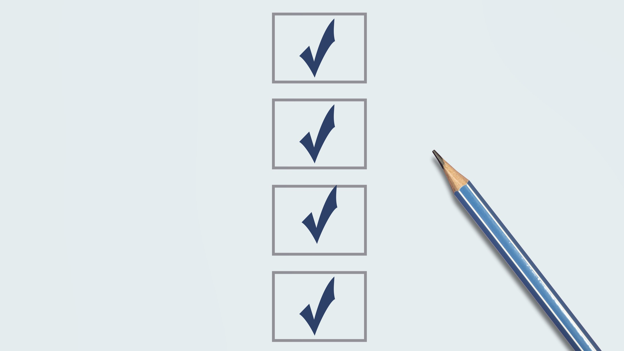 Marking on checklist box. Checklist concept, blue pencil with copy space on blue background