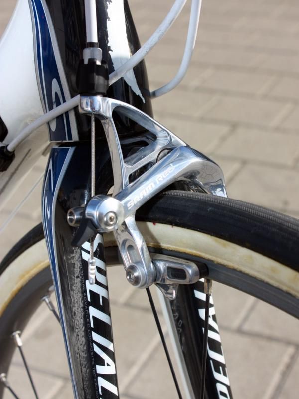 The maxed-out brake pad adjustment on Breschel's SRAM Red caliper reveals the extra tire clearance underneath the fork crown.