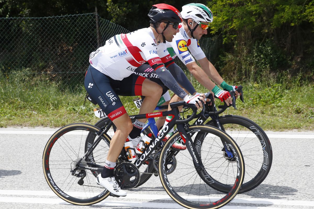 Diego Ulissi (Team UAE Emirates) chatting with Italian champion Elia Viviani (Deccuninck-QuickStep)