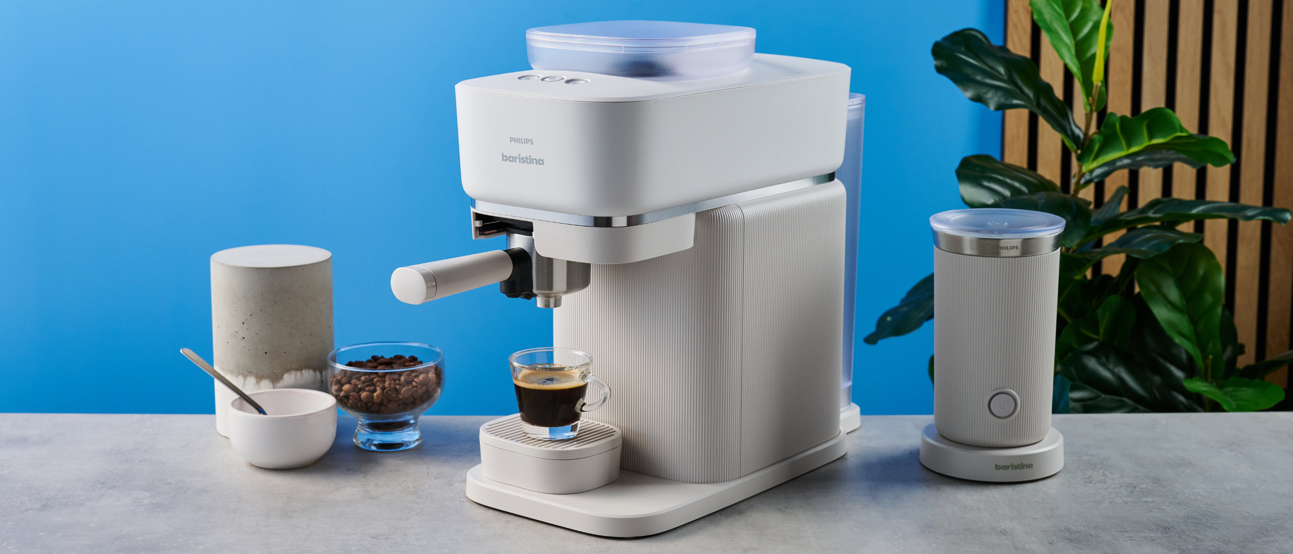 the philips baristina photographed against the blue tom's guide background