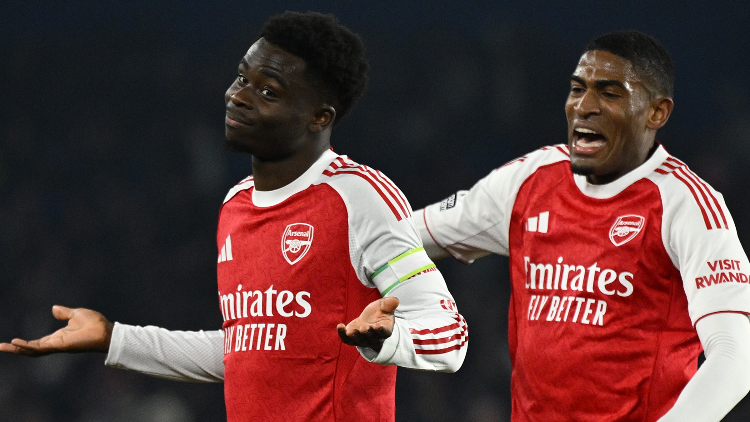 Bukayo Saka of Arsenal celebrates scoring his team's first goal with teammate Cristhian Mosquera during the Premier League match between Brighton &amp; Hove Albion and Arsenal at Amex Stadium on March 04, 2026 in Brighton, England.