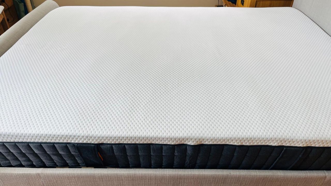 A closeup of the Emma NextGen Cooling Mattress in our reviewer's bedroom