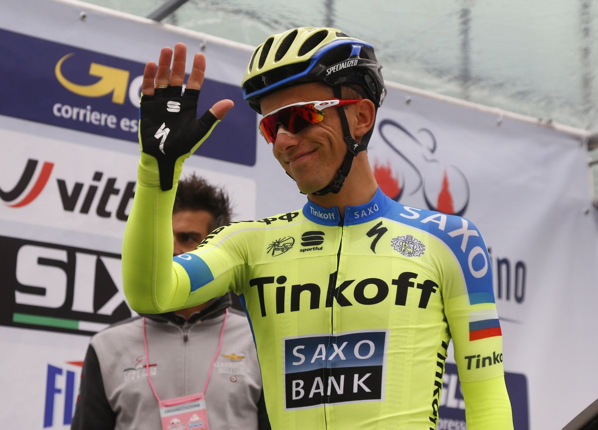 Rafal Majka waves to the crowd