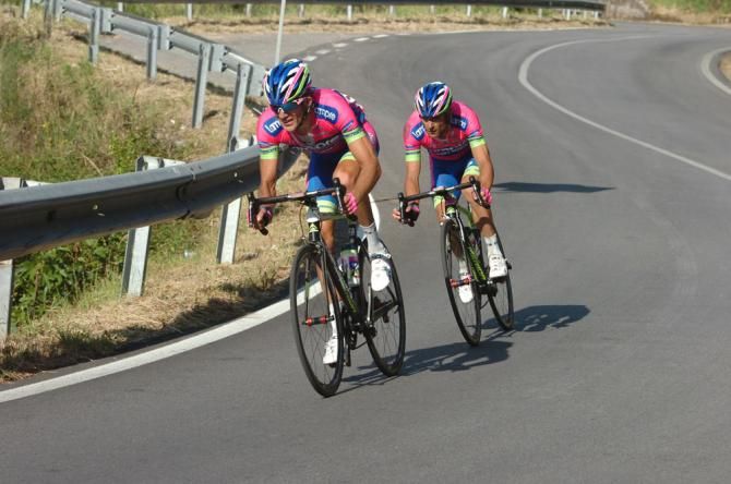 Przemyslaw Niemiec paces Lampre-Merida captain Michele Scarponi as the pair try to regain contact with the leaders after Scarponi ripped off a rear derailleur in the stage finale.