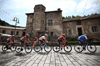 The 2023 Criterium du Dauphiné peloton in the first hour of racing of stage 3