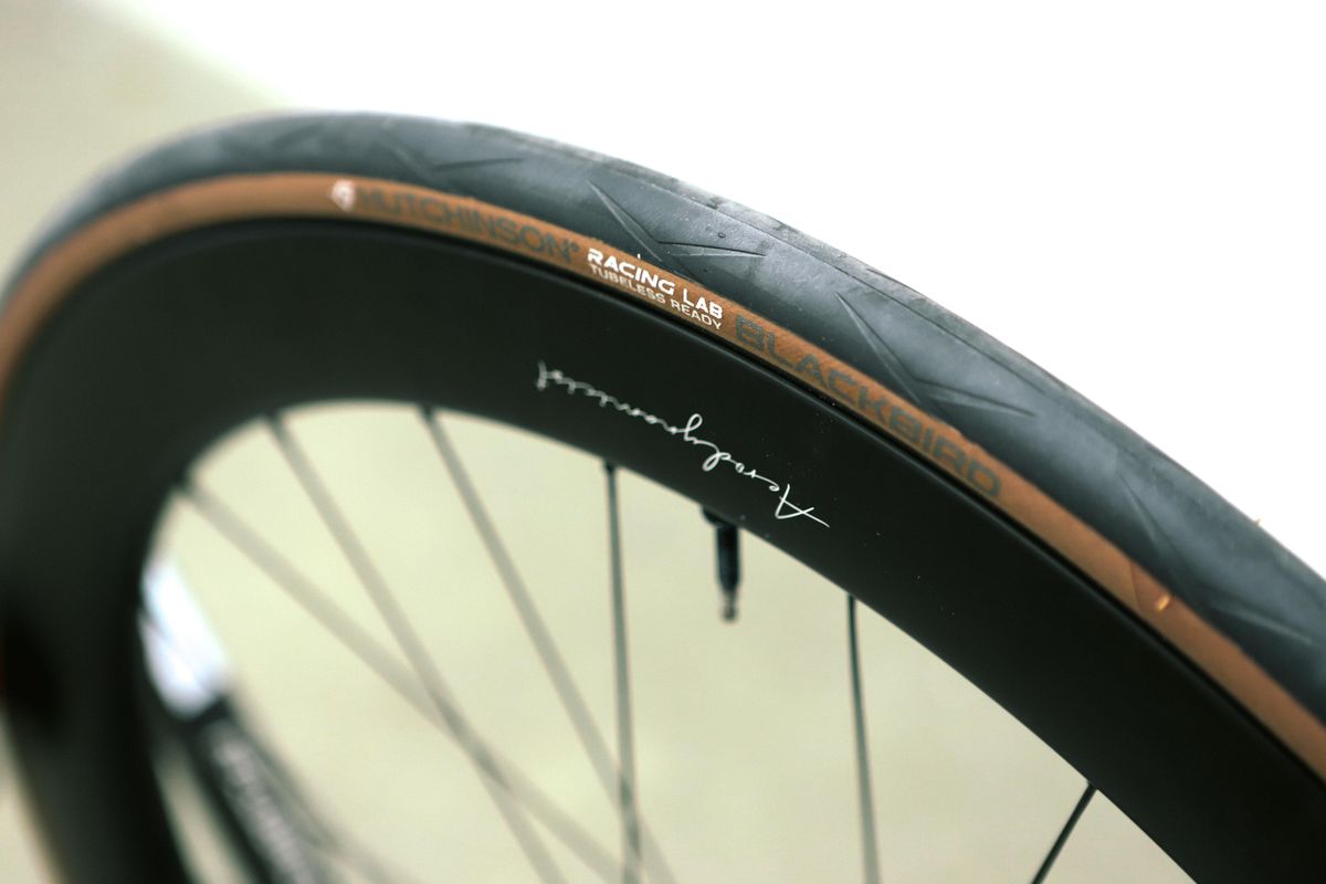 A tan bicycle tyre on a white background