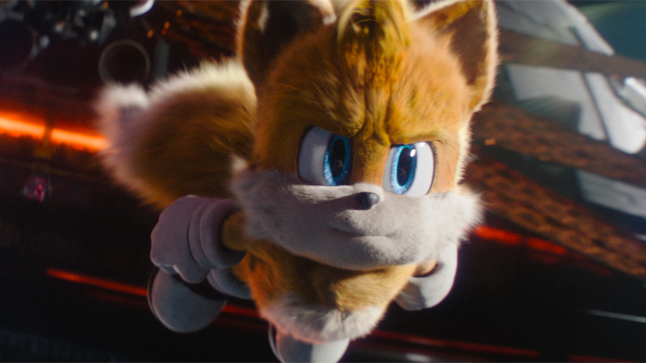 Tails flies through space with a determined look on his face in Sonic the Hedgehog 3.