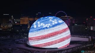 A still from a YouTube video showing the Las Vegas Sphere lit up with the American Flag