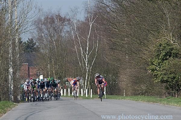 A Lotto rider attacks from the peloton