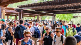 A crowd of people queue to get into Zion National Park in Utah in 2019. 