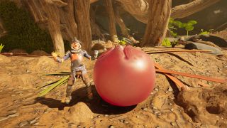 Grounded 2 lingonberry leather chunks: A character posing with their arms up and chest out, as if cheering, next to a lingonberry.