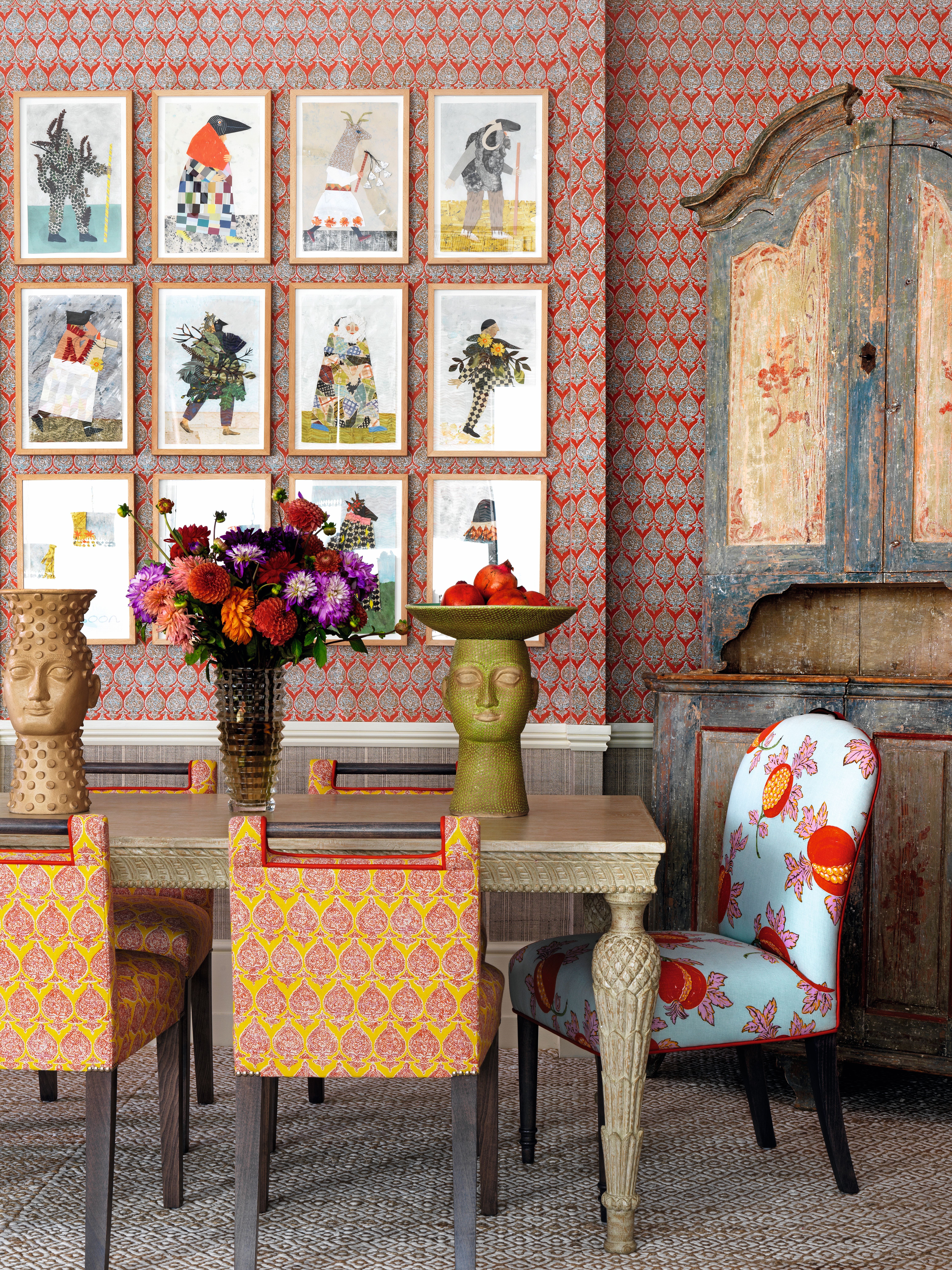 Dining room with antique furniture and gallery wall