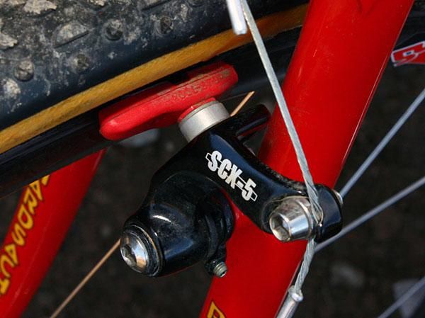 Pads are trimmed in length so the brakes can open up wider for easier wheel changes.