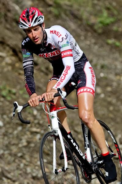 Roman Kilun (Kenda p/b Geargrinder) settles into the hard effort of a steep section