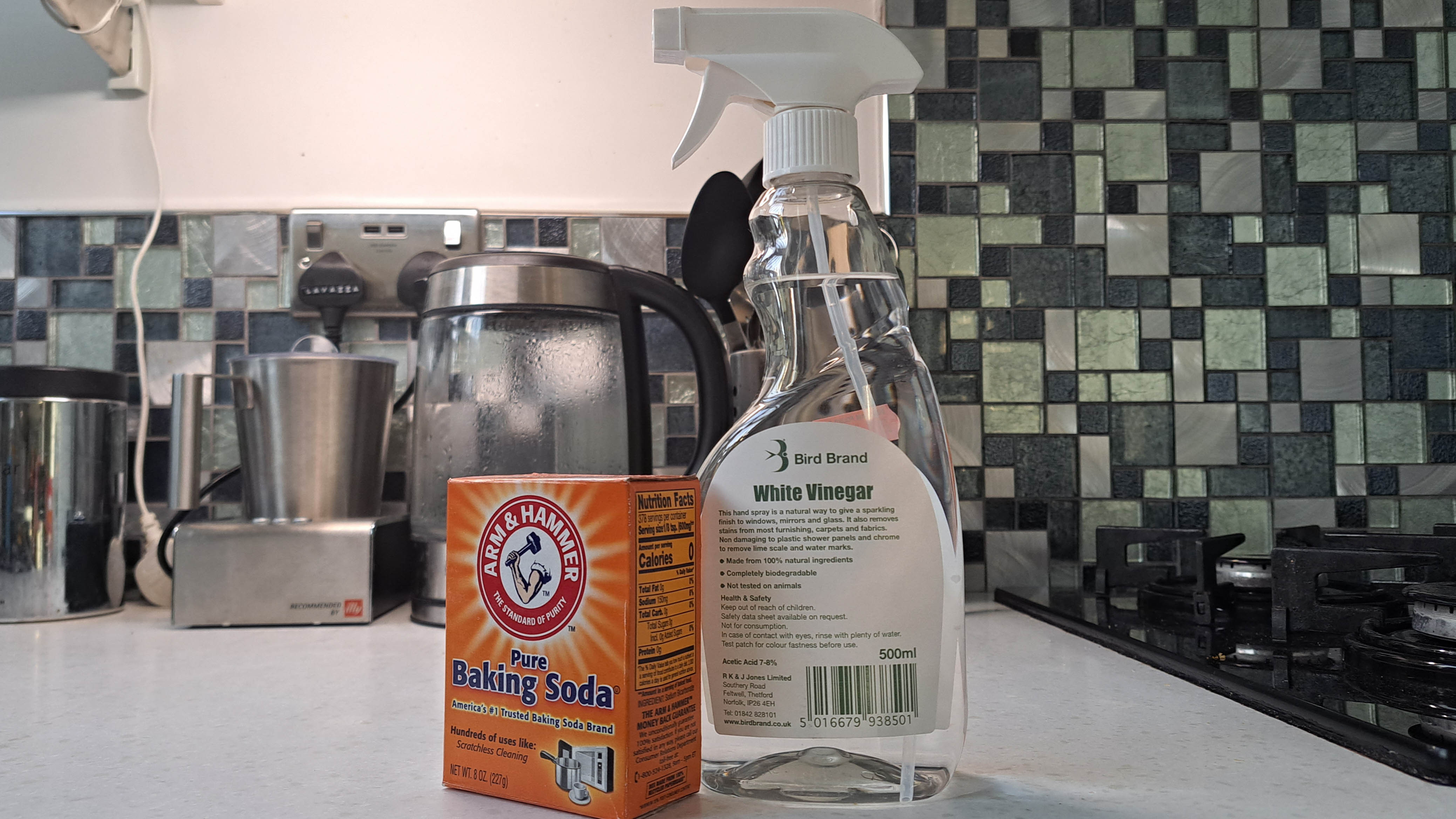 Baking soda and white vinegar on countertop