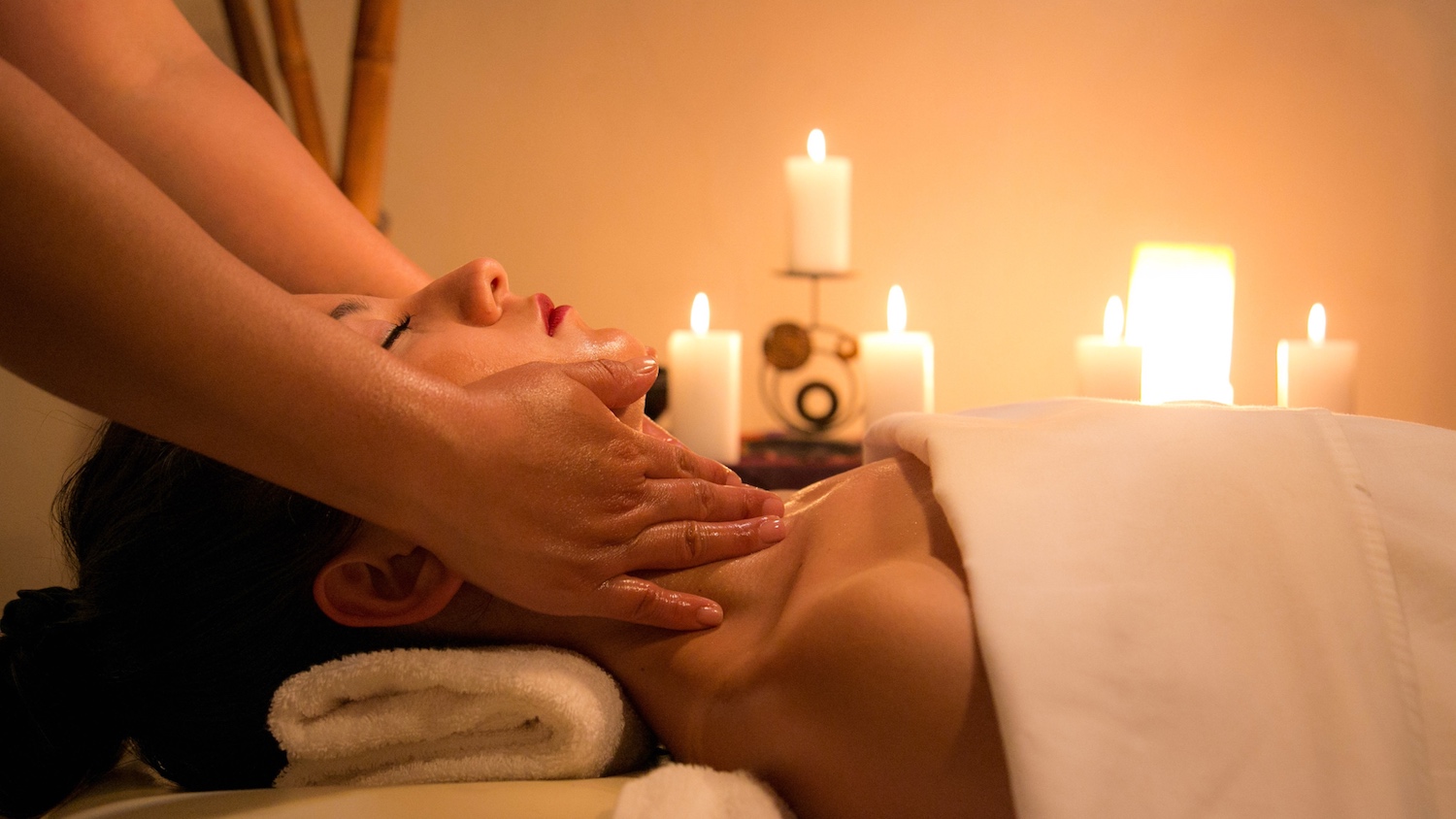How to relax on Mother's Day: a woman receives a facial at a spa