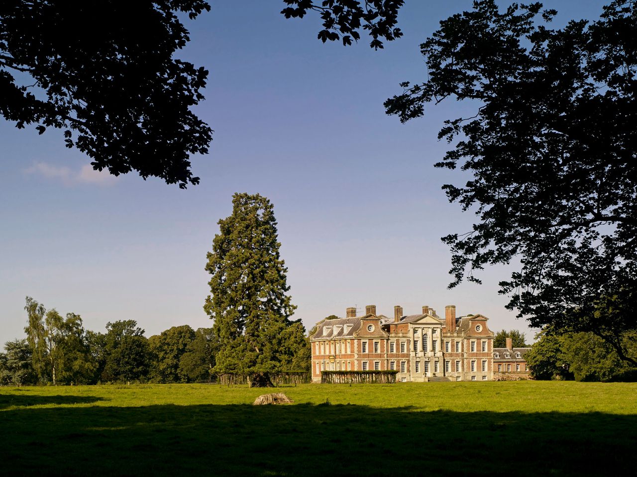 Fig 1: Raynham Hall, Norfolk. The exterior, with a pediment, gabled roofs and chimneys, was extensively reworked in 1704–07.