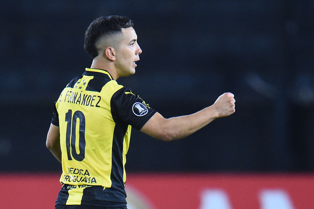 Penarol's midfielder #10 Leonardo Fernandez celebrates after scoring during the Copa Libertadores group stage football match between Uruguay's Penarol and Paraguay's Olimpia at the Campeon del Siglo stadium in Montevideo, on May 14, 2025.