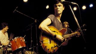 David Byrne and Chris Frantz (drums) and Tina Weymouth (bass) from Talking Heads perform live on stage in New York in 1977