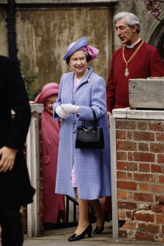 Queen Elizabeth II and the Queen Mother attend the Easter service at St George's Chapel, Windsor, circa 1987.