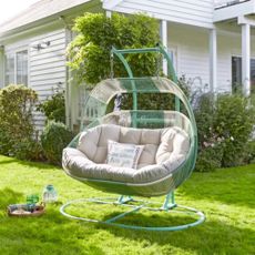 Dunelm Santorini Double Egg Chair in a garden