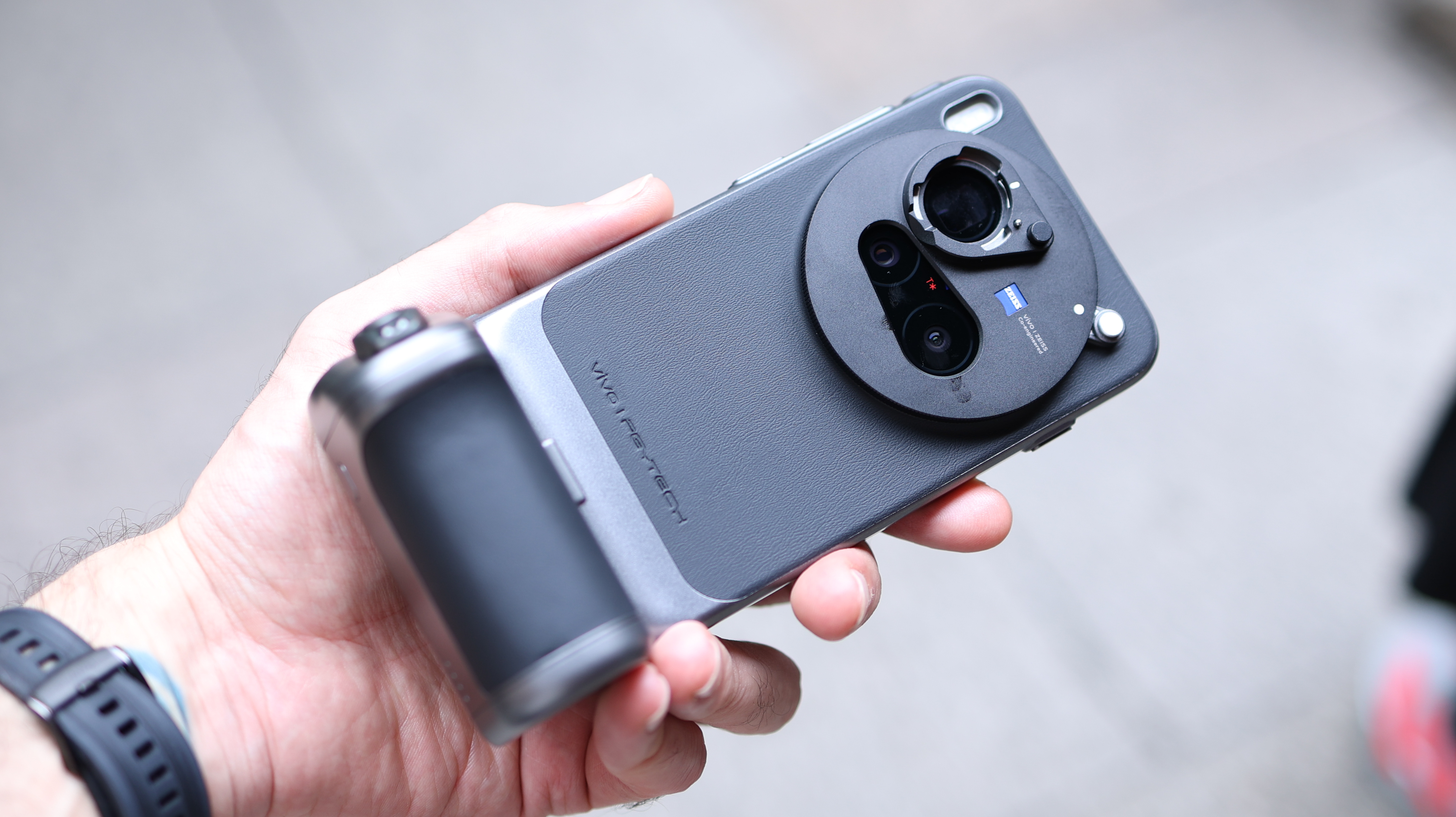 Vivo X300 Pro camera phone held in a hand