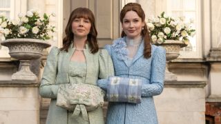 From left to right: Eloise and Francsca standing together in Bridgerton. 