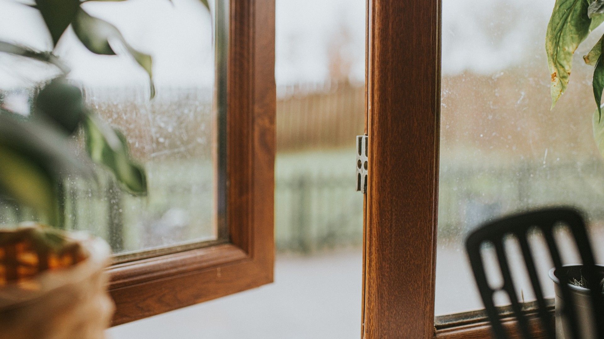 an open window with wooden window slats