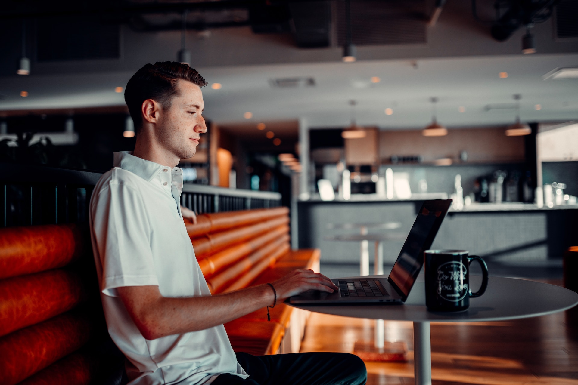 Man typing on laptop