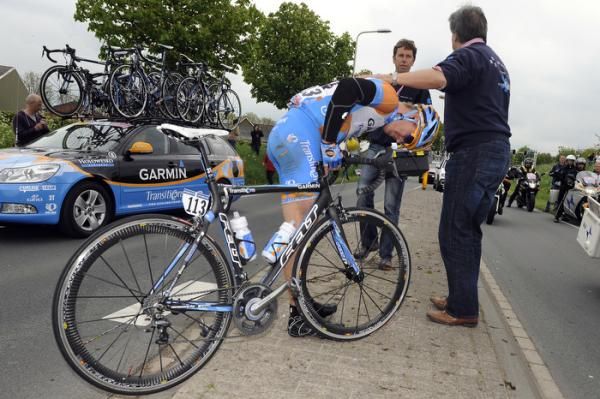 Tyler Farrar (Garmin-Transitions) ensures everything's intact before getting back on his bike after a crash
