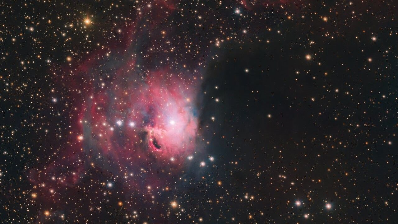Cosmic Redfish Cosmic 'koi fish' swims through starry sea in stunning telescope photo ...