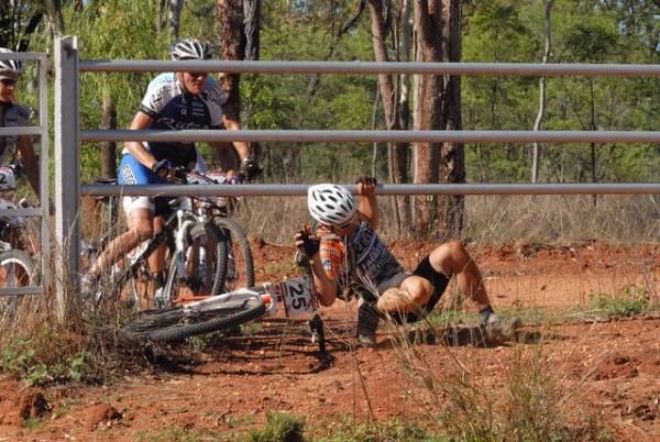 The riders had to go under an fence