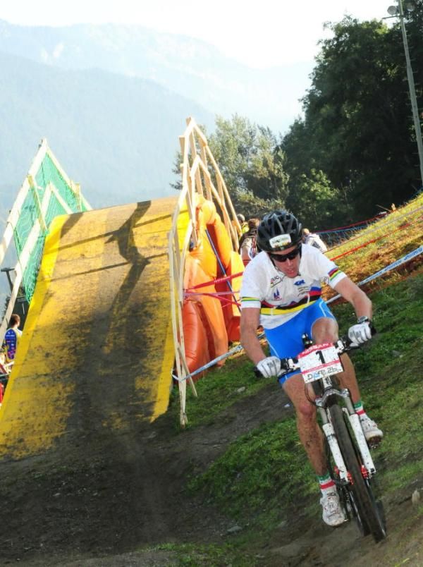 Gerhard Kerschbaumer (Germany) riding off-camber grass to avoid the 4X course