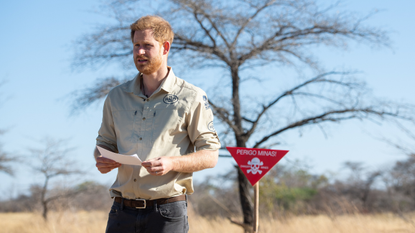 Prince Harry, Duke of Sussex walks through a minefield during a visit to see the work of landmine clearance charity the Halo Trust, on day five of the royal tour of Africa on September 27, 2019 in Dirico, Angola