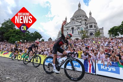 PARIS, FRANCE - JULY 26: Julian Alaphilippe of France and Team Tudor Pro Cycling is passing the Basilique du Sacre-Coeur and is waving at the fans followed by Michael Storer of Australia and Team Tudor Pro Cycling and Bruno Armirail of France and Team Visma | Lease a Bike during Stage 21 of the 113th Tour de France 2026, final stage of 88,7 km between Paris Champs Elysees and Paris Champs Elysees on July 26, 2026 in Paris, France. (Photo by Catherine Steenkeste/Getty Images)