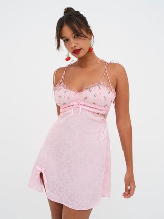pink babydoll slip dress with floral embroidery at the bust